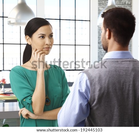 Casual people talking at office, asian female officeworker paying attention.
