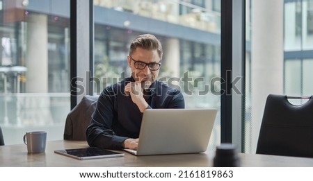 Similar – Image, Stock Photo Man using computer and programming  to break code. Cyber security threat. Internet and network security. Stealing private information. Person using technology to steal password and private data