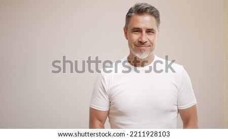 Image, Stock Photo Man in white with long gray hair and glasses standing on a garden with his hands together in meditation