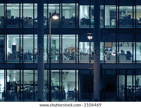 Late night overtime in a modern office building.
