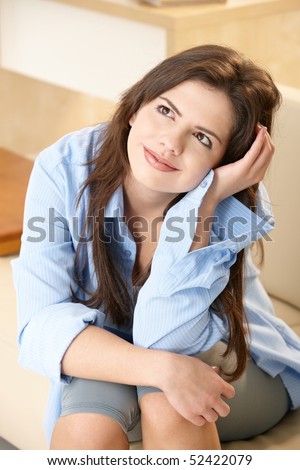 Happy Girl Looking Up With Face Leaning On Hand, Smiling In Sunlit Home ...