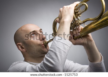 Young man playing the trumpet
