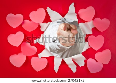 A red Valentine themed background with hearts and a hand pointing through.
