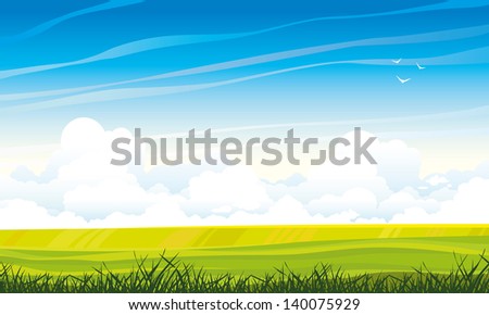 Summer landscape with green meadow and grass on a blue sky background with cumulus clouds