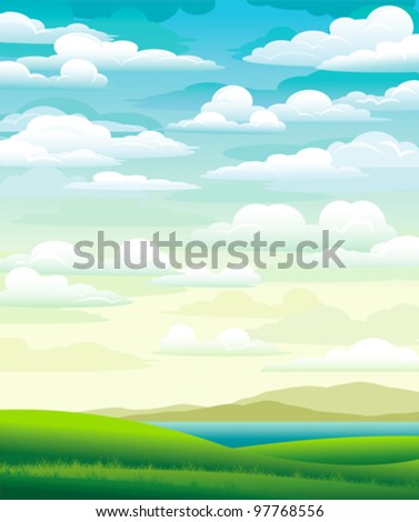 Summer landscape with green meadow and cloudy blue sky