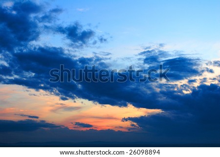 Colorful sky with red, orange and blue clouds
