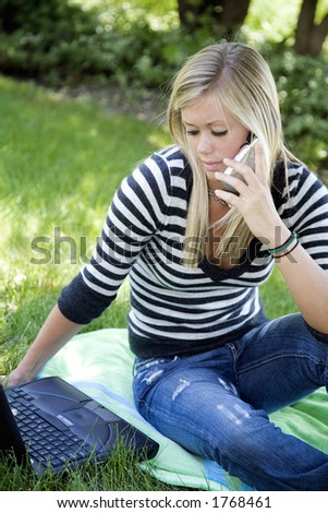 Model Release 358  Teenage girl working on laptop computer outdoors and talking on cell phone