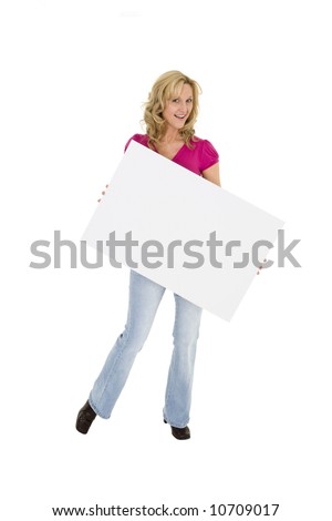 Beautiful Caucasian woman holding a blank sign so you can add your own advertising slogan. She is on a white background.