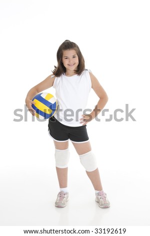 Portrait of a cute eight year old girl in volleyball outfit isolated on a white background