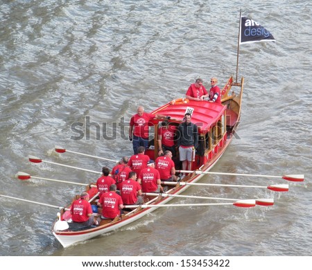 LONDON- SEPT 7: Crews rowing between tower and london bridges, visit london during river thames week, LONDON, SEPT 7, 2013