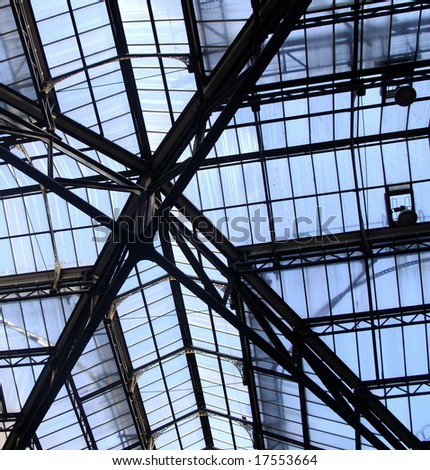Steel beamed glass roof.