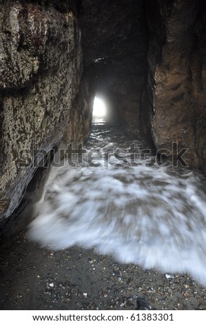 Tunnel with sea waves
