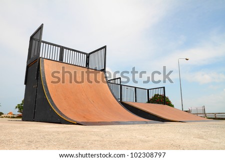 Similar – Image, Stock Photo Skateboard arena in the evening sun, cordoned off with red and white flutterband | Corona Thoughts