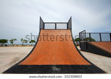 Similar – Image, Stock Photo Skateboard arena in the evening sun, cordoned off with red and white flutterband | Corona Thoughts