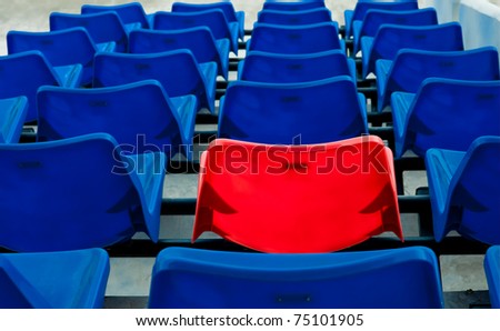 many blue and red vip seat in football stadium