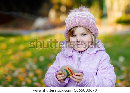 Similar – Image, Stock Photo Corona stones painted by children with the inscription remains healthy