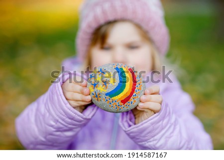 Similar – Image, Stock Photo Corona stones painted by children with the inscription remains healthy