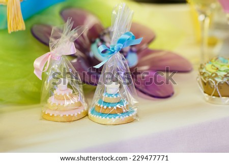 Elegant sweet table with cupcakes and other sweets for dinner or event party, give away for guests as cakes.