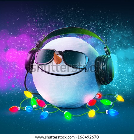 Funny snowball in the headphones. Christmas party. Musical Background