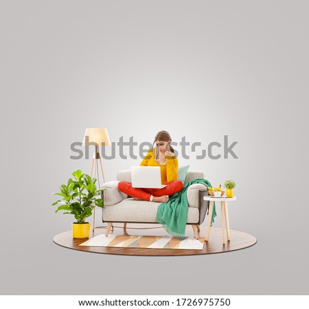 Pretty female working on laptop computer sitting on a couch at her home office. Studying, freelance and home office concept. Unusual 3d illustration