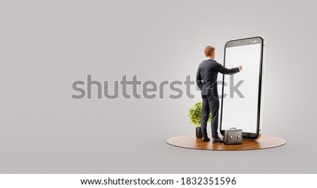 Businessman standing in front of smartphone with Stock market graph. Finance and investment Smartphone apps concept. Unusual 3d illustration