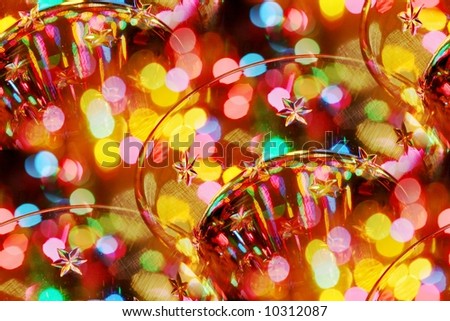 crystal glass with etched stars surrounded by bright mini lights - celebrate!