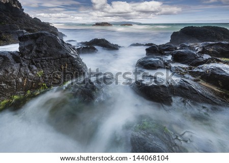 Rocky North Ireland coastline with long time exposure