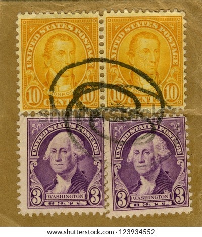 Vintage US stamp depicting US Presidents Washington and Monroe