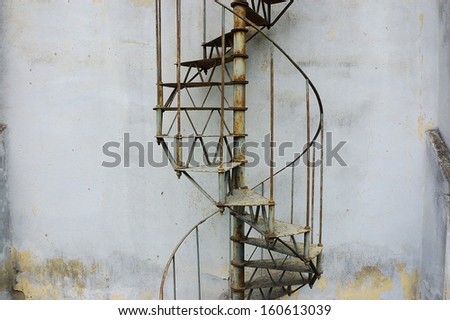 Metal stairs on side of the building