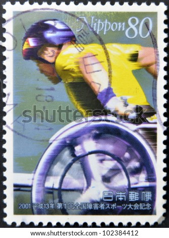 JAPAN - CIRCA 2001: A stamp printed in Japan dedicated to National Sports Festival for People with Disabilities, shows wheelchair race, circa 2001