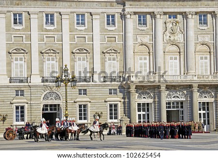 MADRID - DECEMBER 8: Military ceremony of changing of the guard at the Royal Palace chaired by the princes of Asturias, Felipe de Borbon and Letizia Ortiz on December 8, 2011 in Madrid, Spain