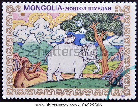 MONGOLIA - CIRCA 1984: A stamp printed in Mongolia shows reunion of animals in the jungle, circa 1984