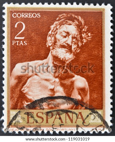 SPAIN - CIRCA 1968: stamp printed in Spain shows painting of Old Man in the Sun by Fortuny, circa 1968