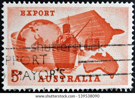 AUSTRALIA - CIRCA 1963: A stamp printed in Australia dedicated to Importance of exports to Australian economy shows Globe, Ship, Plane and Map of Australia, circa 1963