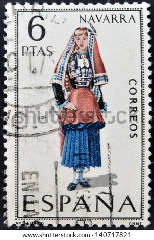SPAIN - CIRCA 1969: A stamp printed in Spain dedicated to Provincial Costumes shows a woman from Navarra, circa 1969