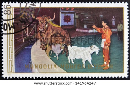 MONGOLIA - CIRCA 1986: A stamp printed in Mongolia shows trick with animals, circa 1986