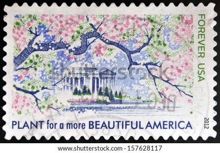 UNITED STATES OF AMERICA - CIRCA 2012: A stamp printed in USA dedicated to Lady Bird Johnson, shows Plant for more Beautiful America, circa 2012