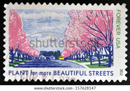 UNITED STATES OF AMERICA - CIRCA 2012: A stamp printed in USA dedicated to Lady Bird Johnson, shows Plant for more Beautiful Streets, circa 2012