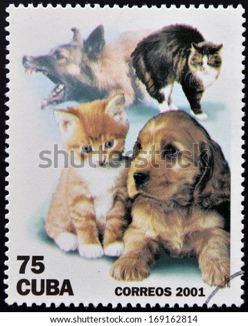 CUBA - CIRCA 2001: A stamp printed in the Cuba shows dogs and cats, circa 2001