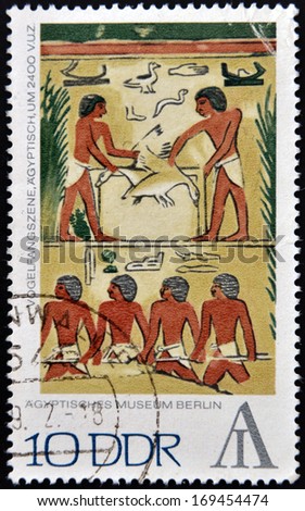 GERMANY - CIRCA 1972: A stamp printed in the East Germany shows Egyptian Museum Berlin - fowling scene, Egypt, around 2400 BCE, circa 1972.