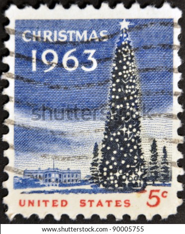 UNITED STATES OF AMERICA - CIRCA 1963- A stamp printed in USA shows the White House and the National Christmas Tree in Washington DC., circa 1963.