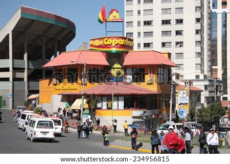 BOLIVIA, LA PAZ, 13 AUGUST 2013 - People at Famous Pollos Copacabana fast food restaurant sign in La Paz, Bolivia, South America