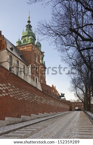 The Coat of Arms Gate at the Royal Castle on Wawel Hill in the city of Kracow in Poland.