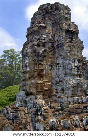 Bayon Temple near Angkor Wat in Cambodia in South East Asia. This is a well-known and richly decorated Khmer temple at Angkor and was built in the late 12th century or early 13th century. UNESCO site.