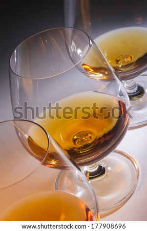 Line of Brandy snifters with French Brandy (Cognac).