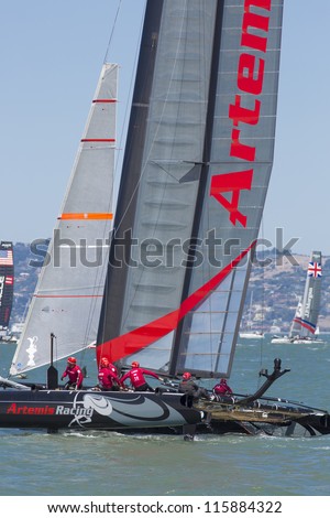 SAN FRANCISCO, CA - AUGUST 26: British team and the American team try to overtake the Swedish team in the bay of San Francisco during the final of the America\'s Cup 2012. Aug 26 2012