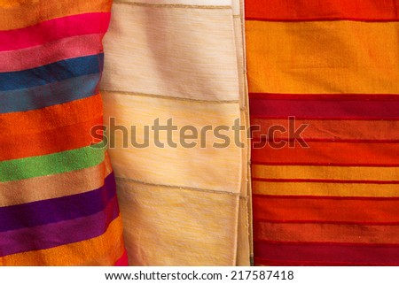 A variety of colored cloths and silks from Northern Africa. Morocco, Essaouira.
