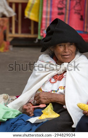 OTAVALO, ECUADOR - FEB 28: Unidentified Ecuadorian old woman at the Otavalo Market. Most of the Ecuadorian people belong to the Mestizo ethnic group, famous for their art and music. Ecuador 2015.
