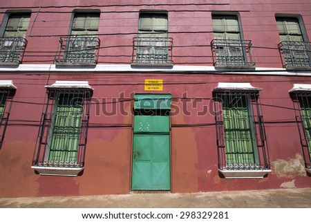 CIUDAD BOLIVAR, VENEZUELA, APRIL 9: Red colonial facade of the Historical Museum of Guyana within the old colonial district of Ciudad Bolivar, Venezuela 2015.