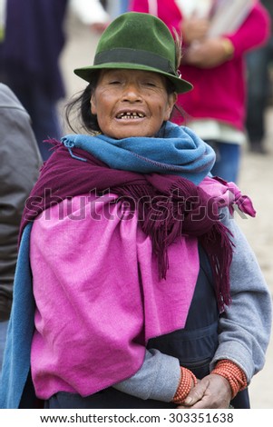 OTAVALO, ECUADOR - FEB 28, 2015: Unidentified Ecuadorian old woman at the Otavalo Market. Most of the Ecuadorian people belong to the Mestizo ethnic group, famous for their art and music. Ecuador.